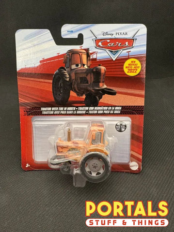 Cars on the Road: Tractor With Tire In Mouth